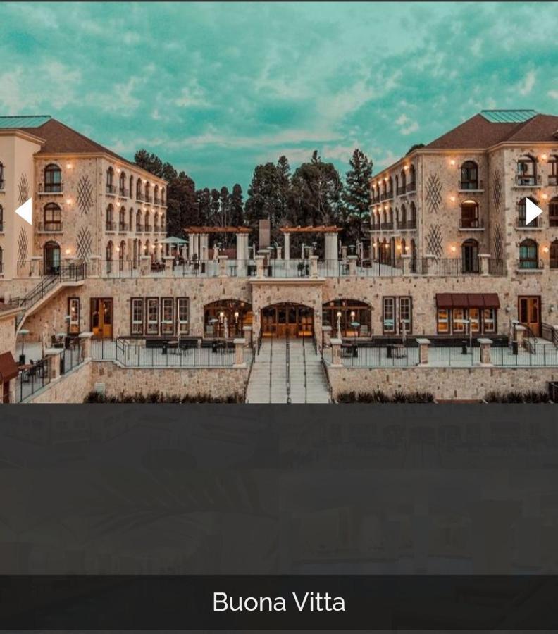Buona Vitta Gramado Resort & Spa By Gramado Parks Zewnętrze zdjęcie The photo shows a spacious and elegant building design, likely a hotel or resort. The structure features multiple stories and large windows, with outdoor seating areas visible on a terrace or patio. The exterior has a combination of stone and modern 